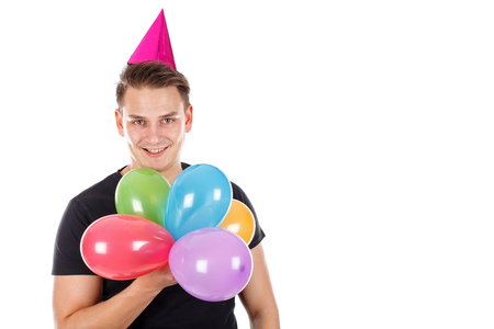 Picture of a sweet young man at his girlfriend's birthdayの写真素材