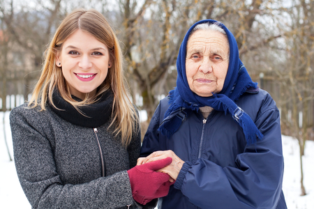 Picture of a beautiful female posing with her grandmotherの写真素材