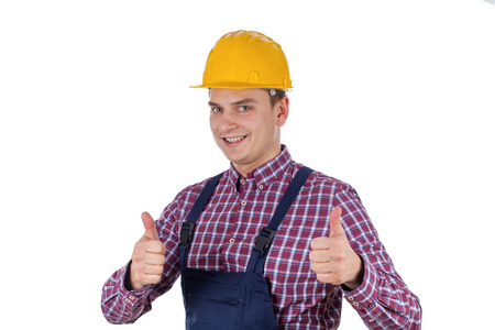 Picture of a smiling young engineer showing thumbs up