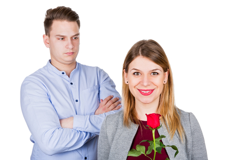 Picture of a young couple after a fight posing on an isolated backgroundの写真素材