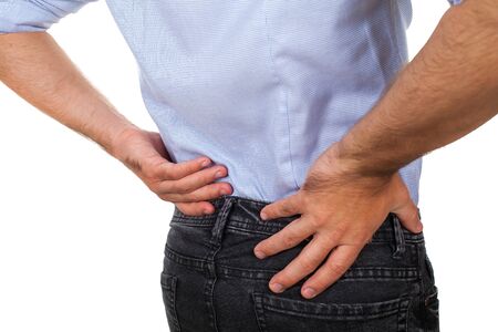 Close up picture of a young man having a serious back pain