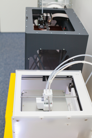 White electronic 3d printer. Plastic printing. Modern technology