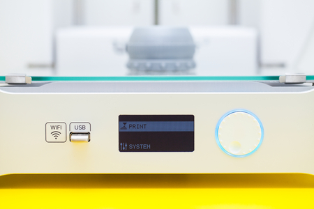 White electronic 3d printer. Plastic printing. Modern technology