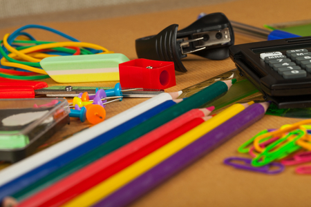 Colorful school supplies for creative handcrafts - scrissors, colorful pencils, sharpener, paper, etc.の写真素材