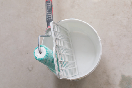 Apartment renovation, wall coloring, painting tools , new home, construction, rollerの写真素材