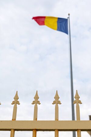 Picture of iron fence and the romanian flag at the bulgarian border, near Vama Vecheの写真素材