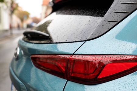 Scenic picture of a street in Sibiu medieval center, cars parked along the roadの写真素材