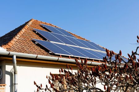 Modern house with solar panels on the roof