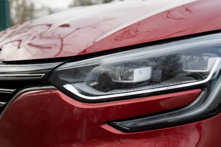 Close up picture of the modern car led headlightsの写真素材