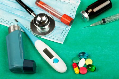 Picture of a colourful pills, capsules, stethoscope and pack of medicines