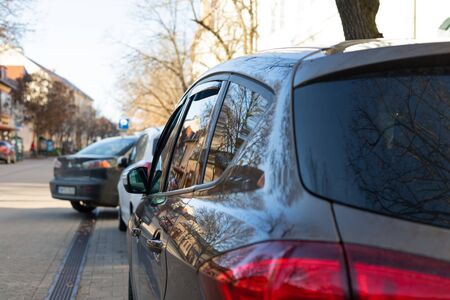 Picture of cars in the parking lot at a city downtownの写真素材