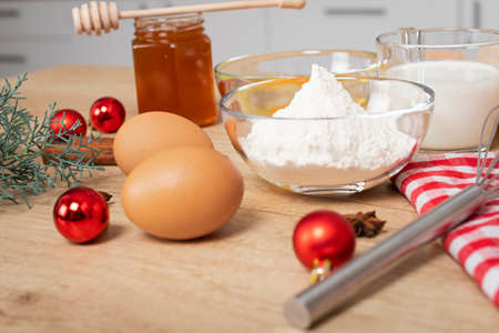 Homemade gingerbread ingredients on wooden table - Advent activity tradition, Christmas recipesの写真素材