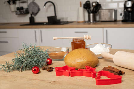 Christmas recipes - Homemade gingerbread dough on wooden background