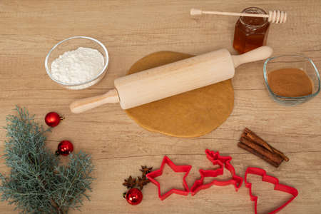 Christmas recipes - Homemade gingerbread dough on wooden backgroundの写真素材