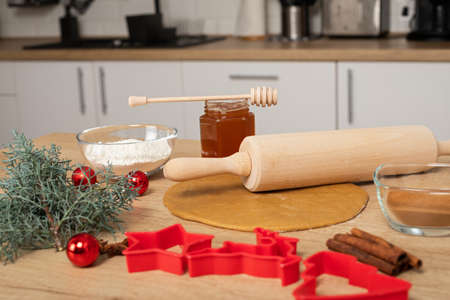 Christmas recipes - Homemade gingerbread dough on wooden background