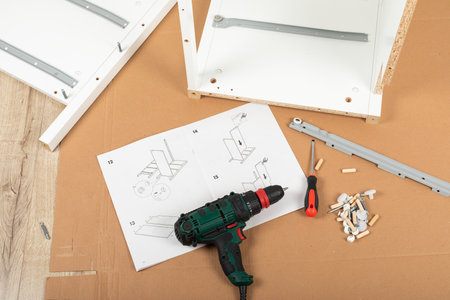 Close up picture of carpenter tools for furniture assembling at home