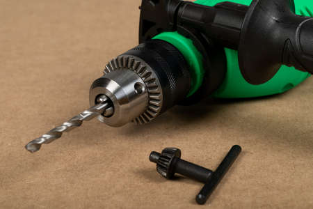 Picture of a brand new green electric drillの写真素材