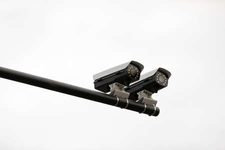 Security surveillance camera system attached on the traffic light pole