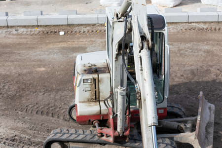 Picture of an excavators machine in construction site
