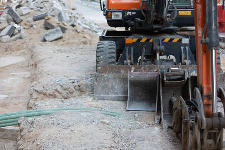 Picture of an excavators machine in construction site