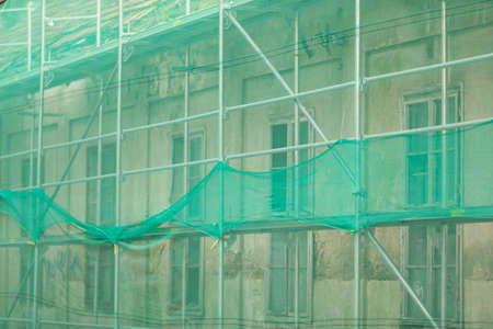 Scaffolding steel frame installation on a construction site