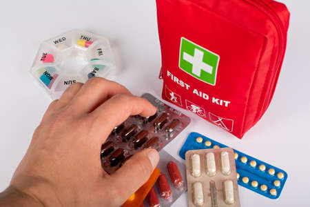 Top view of a first aid medical kit on white background