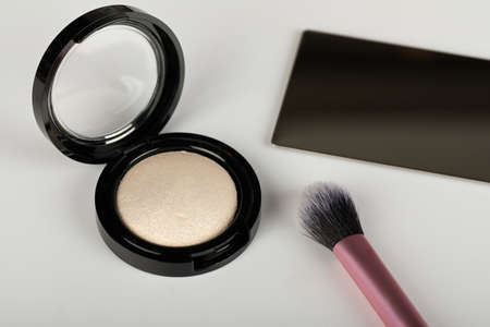 Close up picture of make up products and accessories, contour palette, brushes on white backgroundの写真素材