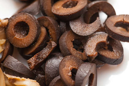Close up picture of sliced black olivesの写真素材