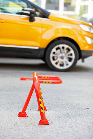 Picture of a red parking lot barrier