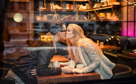 Young teen boy-girl couple, Kissingの写真素材