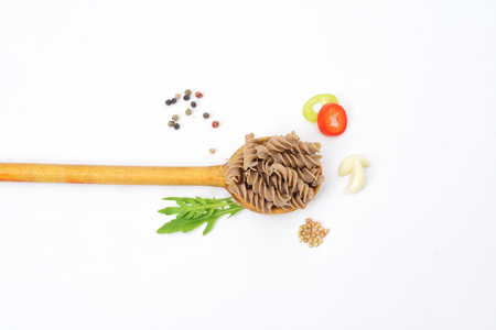 Healthy organic  food background with various vegetables ingredients and pasta, Clean image concept for designers, chefs and cook booksの写真素材