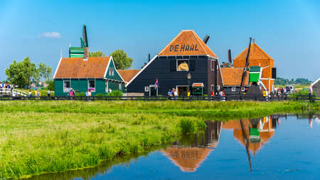 Traditional wooden houses near Amsterdam in the village of Zaanse Schans,の写真素材