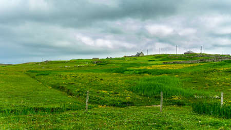 Farm on a hilltop in Shetland Islands