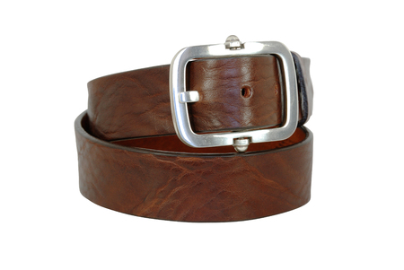 Brown leather belt with big buckle on white backgroundの写真素材