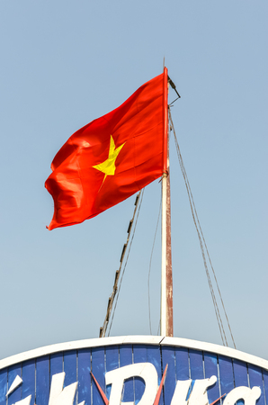 Vietnam flag on pole on shipの写真素材