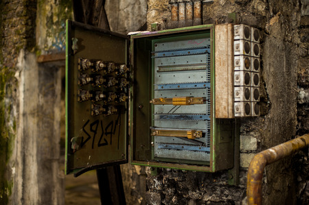 Open fuse box in industry ruinsの写真素材