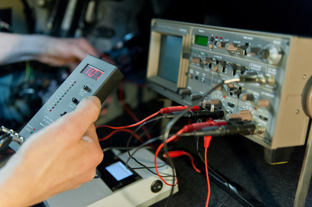 Hand of an electrician at workの写真素材