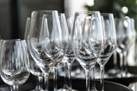 Empty glasses on plattersの写真素材