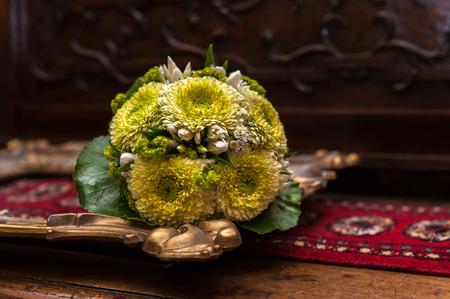 Still life of flowers on picture frameの写真素材