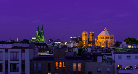 Cathedral of cologne and big church at nightの写真素材