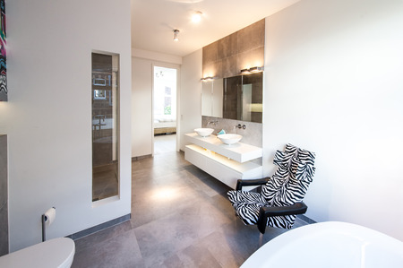 Modern and comfortable interior of a bath roomの写真素材