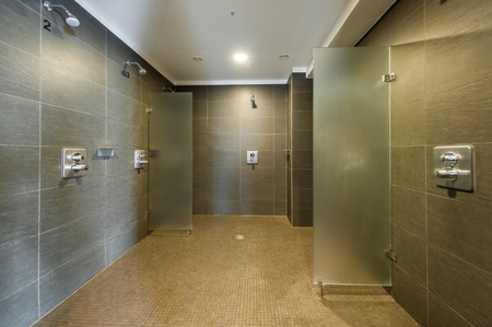 Clean and modern shower room in fitness studioの写真素材