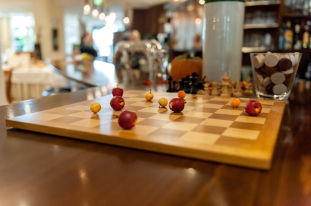 Chess board with applesの写真素材