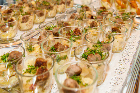 Appetizers in small glassesの写真素材