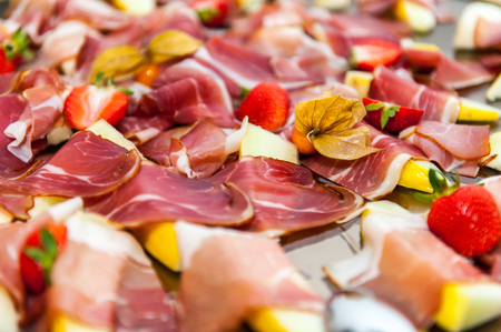 Smoked bacon appetizers on platterの写真素材