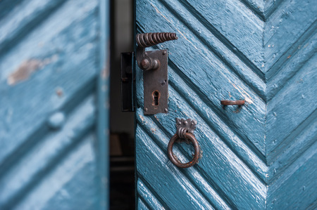 lock on slight open vintage colored doorの写真素材