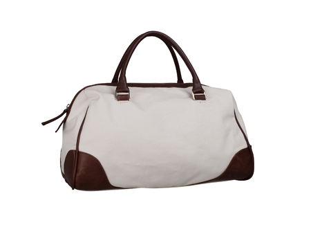 Fabric handbag with leather patches isolated on white backgroundの写真素材