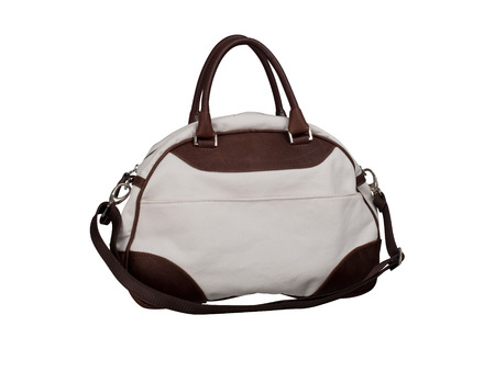 Fabric handbag with leather patches isolated on white backgroundの写真素材