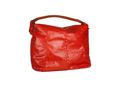 Red leather handbag isolated on white backgroundの写真素材