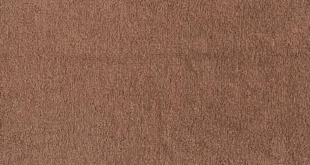 Brown towel texture background. Dark beige towel texture. Textile.の写真素材